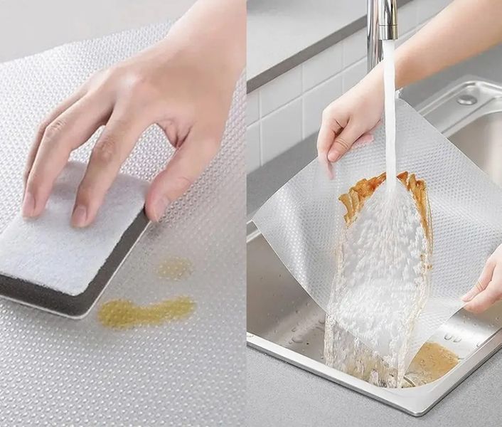 Скатертина антиковзка, рулон 0.3*1.5 м, під столові прибори, для поличок, ящиків та ін. Прозора 062p 13993 фото